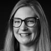 En profilbild av fastighetsmäklare Maria Kjellberg