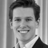 En profilbild av fastighetsmäklare August Hollsten