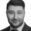 En profilbild av fastighetsmäklare Seydo Aydogan