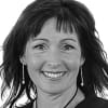 En profilbild av fastighetsmäklare Ulrica Johansson