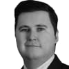 En profilbild av fastighetsmäklare Simon Andersson
