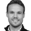 En profilbild av fastighetsmäklare Joakim Carlström
