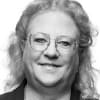 En profilbild av fastighetsmäklare Agnetha Pettersson