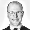 En profilbild av fastighetsmäklare Oskar Cronqvist