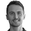 En profilbild av fastighetsmäklare Adi Aganovic