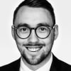 En profilbild av fastighetsmäklare Jacob Bergfelt
