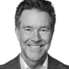 En profilbild av fastighetsmäklare Marcus Finn