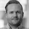 En profilbild av fastighetsmäklare Alexander Bladh