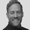 En profilbild av fastighetsmäklare Henrik Borglin