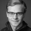 En profilbild av fastighetsmäklare Hugo Evebring