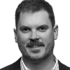 En profilbild av fastighetsmäklare Magnus Willes