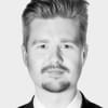 En profilbild av fastighetsmäklare Linus Olsson