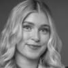 En profilbild av fastighetsmäklare Caroline Bergström