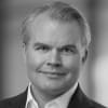 En profilbild av fastighetsmäklare Erik Lundkvist