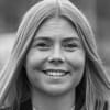 En profilbild av fastighetsmäklare Emmy Didriksson