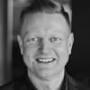 En profilbild av fastighetsmäklare Karl Dahlin
