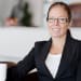En profilbild av fastighetsmäklare Ann Skoglund