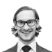 En profilbild av fastighetsmäklare Martin Lundberg