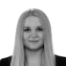 En profilbild av fastighetsmäklare Alice Gren