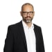En profilbild av fastighetsmäklare Joakim Soneklint