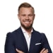 En profilbild av fastighetsmäklare Johan Sandberg
