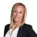 En profilbild av fastighetsmäklare Sandra Tibring