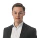 En profilbild av fastighetsmäklare Oliver Ekdahl
