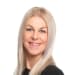 En profilbild av fastighetsmäklare Monica Norberg