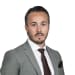 En profilbild av fastighetsmäklare Petter Lindmark
