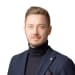 En profilbild av fastighetsmäklare Richard Östlund