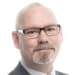 En profilbild av fastighetsmäklare Torbjörn Sverker