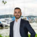 En profilbild av fastighetsmäklare Aidin Moshiri