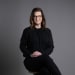 En profilbild av fastighetsmäklare Anna Maria Kronqvist
