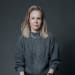 En profilbild av fastighetsmäklare Anna Salinas