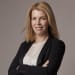En profilbild av fastighetsmäklare Camilla Lindgren