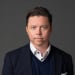 En profilbild av fastighetsmäklare Lars Nordensvärd