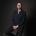 En profilbild av fastighetsmäklare Joel Andersson