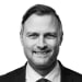En profilbild av fastighetsmäklare Andreas Wallmark