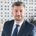 En profilbild av fastighetsmäklare Mohammad Schütt Salimzadeh