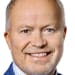 En profilbild av fastighetsmäklare Lars-Åke Helin
