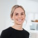 En profilbild av fastighetsmäklare Emelie Rågfeldt