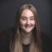 En profilbild av fastighetsmäklare Amanda Bremer Andersson
