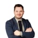 En profilbild av fastighetsmäklare Erik Andréasson Yde