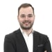 En profilbild av fastighetsmäklare Niklas Appelbrant