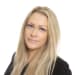 En profilbild av fastighetsmäklare Linda Nilsson