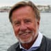En profilbild av fastighetsmäklare Jörgen Warberg