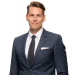 En profilbild av fastighetsmäklare Robin Rydén