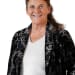 En profilbild av fastighetsmäklare Anette Eliasson
