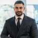 En profilbild av fastighetsmäklare George El Ashkar