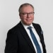 En profilbild av fastighetsmäklare Johan Hallquist